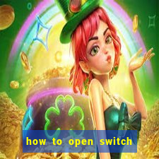 how to open switch oled game card slot